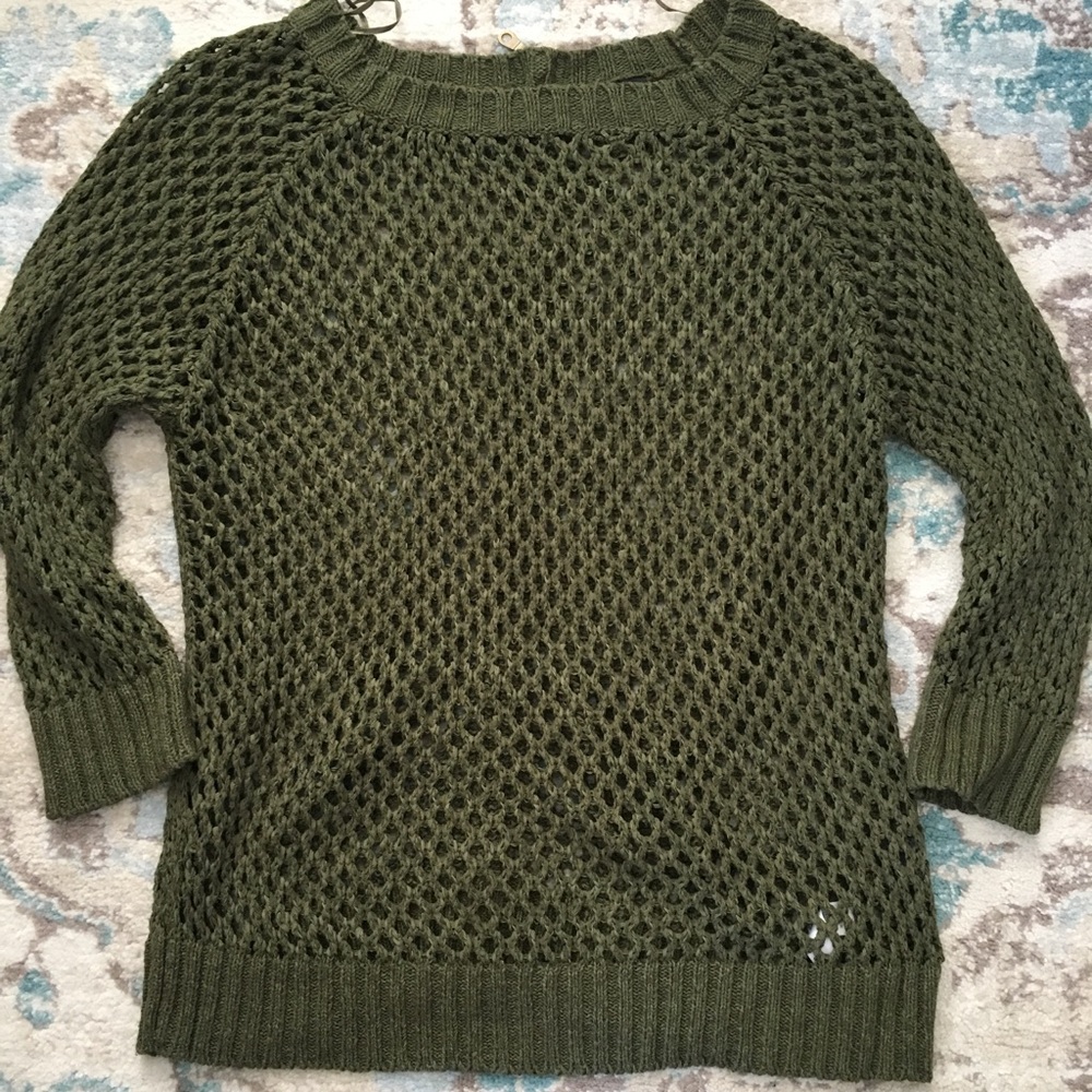 Green sweater with back zipper